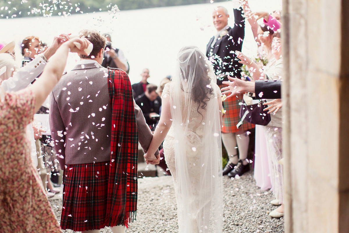 Kimberley wore 'Mystere' by Claire Pettibone for her ethereal and elegant Midsummer Nights Dream inspired wedding at Cottiers in Glasgow. Photography by Craig & Eva Sanders.