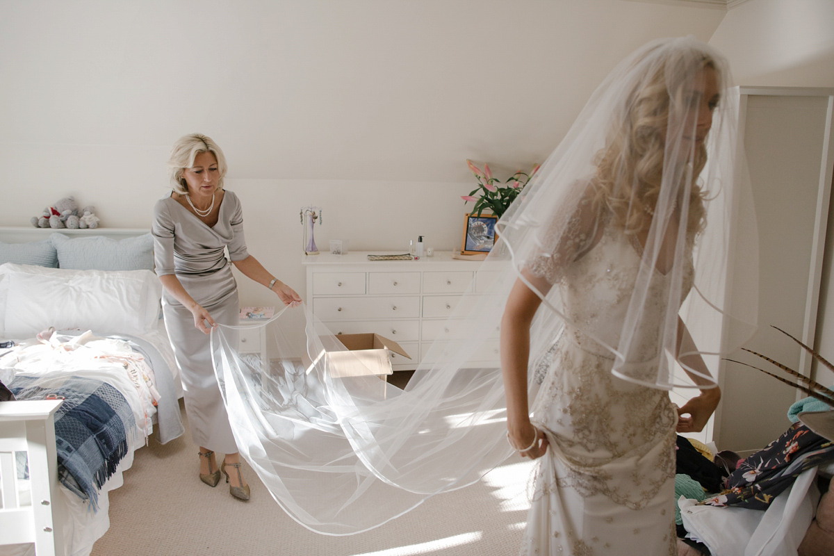 Julia wore the Leila gown by Jenny Packham for her rustic, Autumn wedding at The Byre at Inchyra. Photography by Jen Owens.