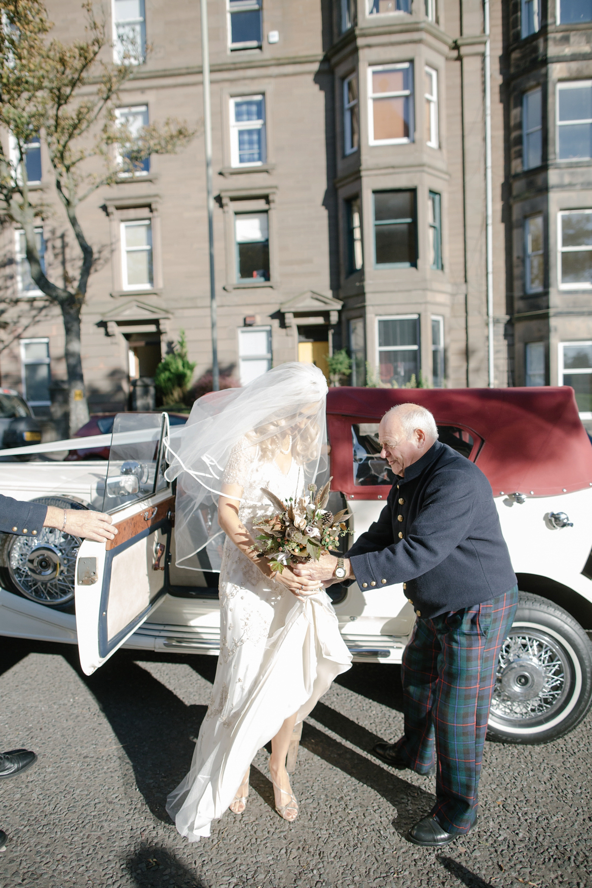 Julia wore the Leila gown by Jenny Packham for her rustic, Autumn wedding at The Byre at Inchyra. Photography by Jen Owens.