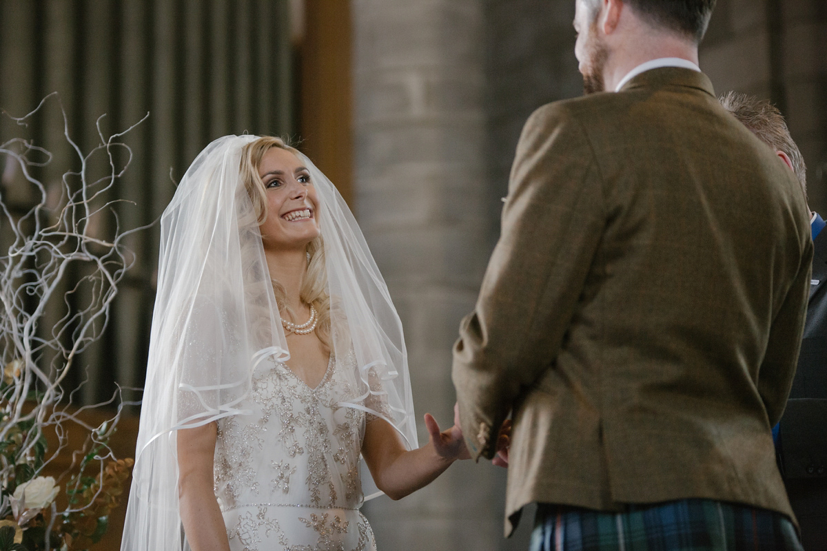 Julia wore the Leila gown by Jenny Packham for her rustic, Autumn wedding at The Byre at Inchyra. Photography by Jen Owens.