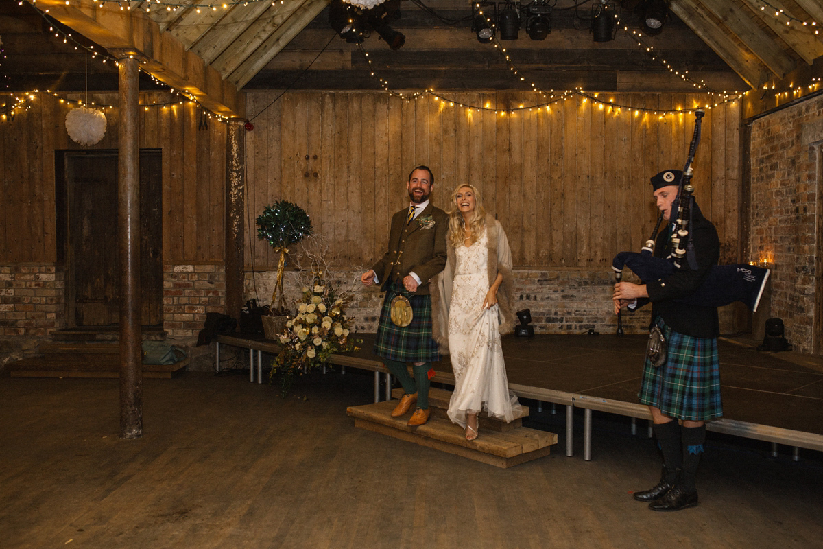 Julia wore the Leila gown by Jenny Packham for her rustic, Autumn wedding at The Byre at Inchyra. Photography by Jen Owens.