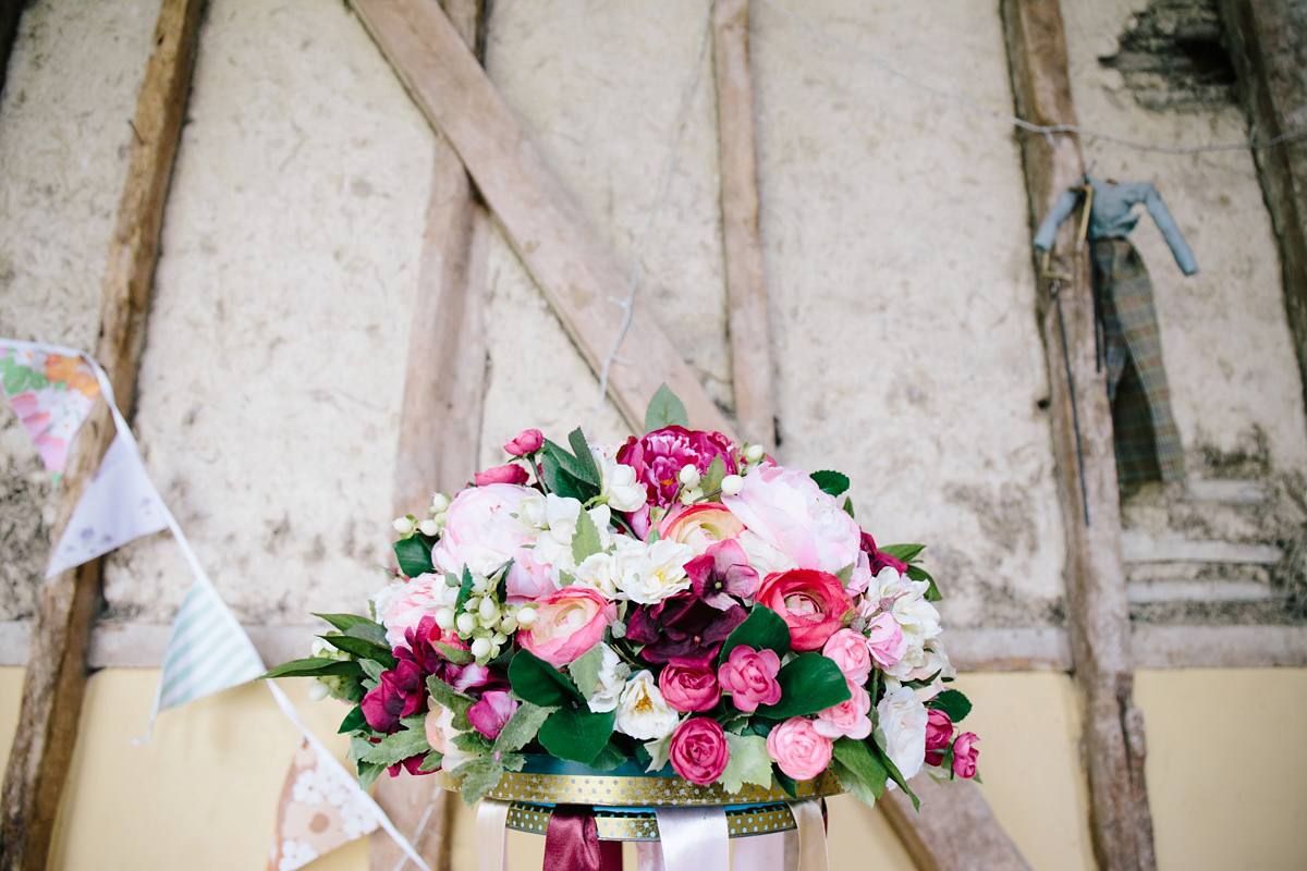 Fran wore a bohemian lace dress for her festival inspired vow renewal held in a meadow. Photography by Joshua Patrick.