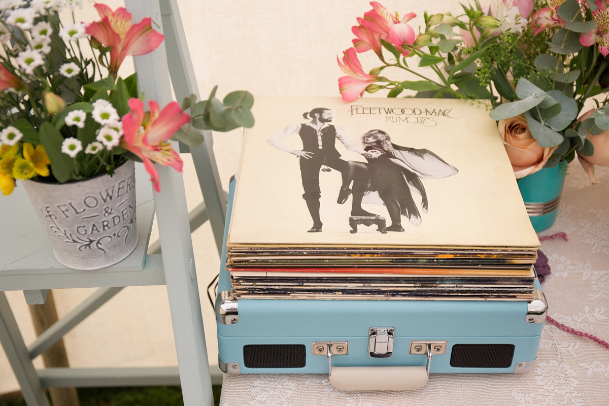 Fran wore a bohemian lace dress for her festival inspired vow renewal held in a meadow. Photography by Joshua Patrick.