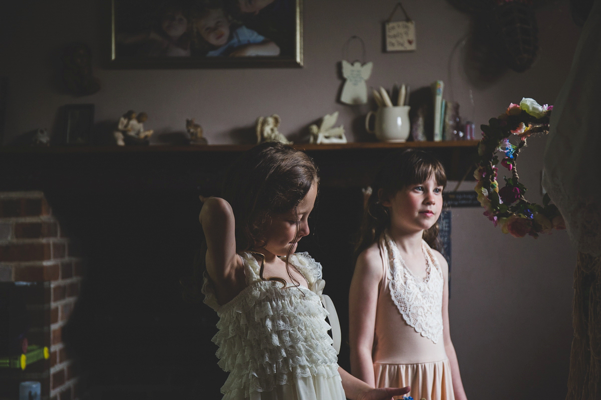 Fran wore a bohemian lace dress for her festival inspired vow renewal held in a meadow. Photography by Joshua Patrick.