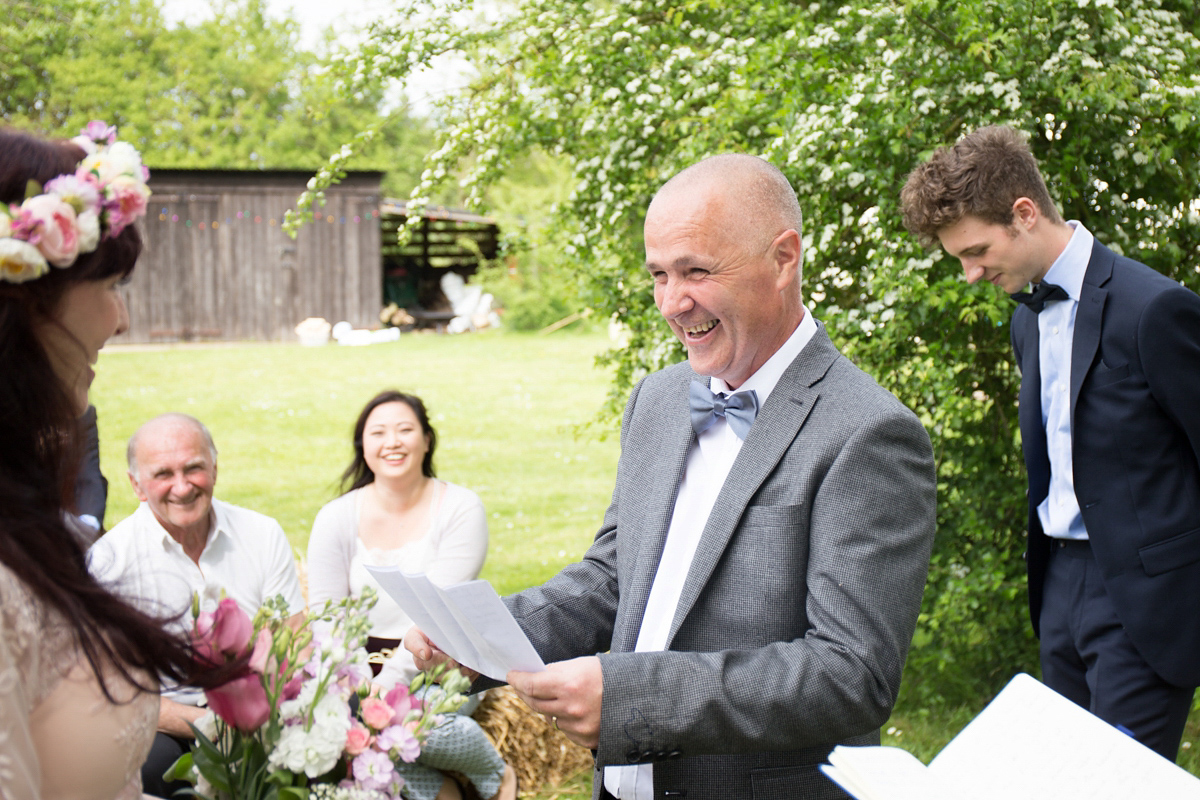 Fran wore a bohemian lace dress for her festival inspired vow renewal held in a meadow. Photography by Joshua Patrick.