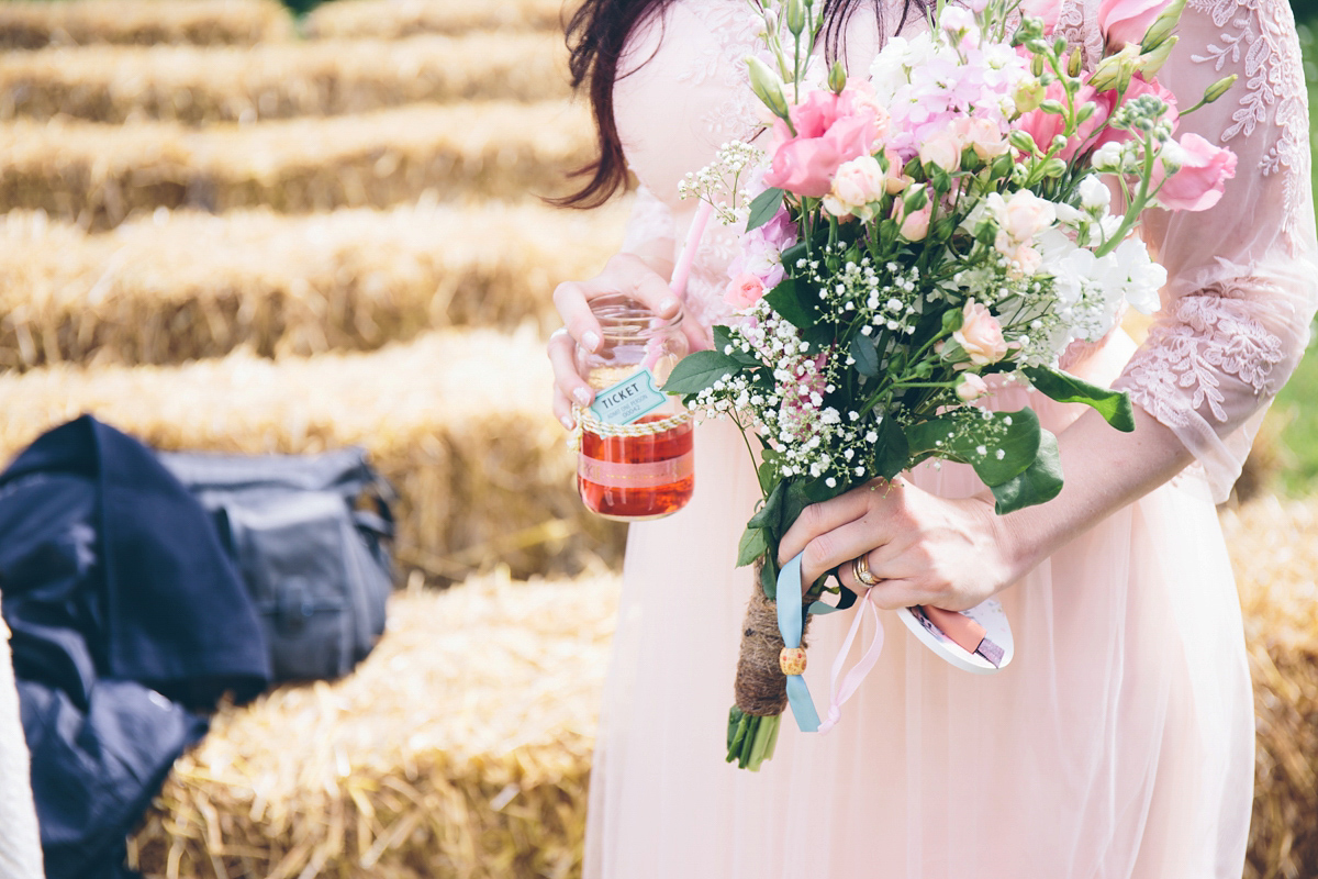 Fran wore a bohemian lace dress for her festival inspired vow renewal held in a meadow. Photography by Joshua Patrick.