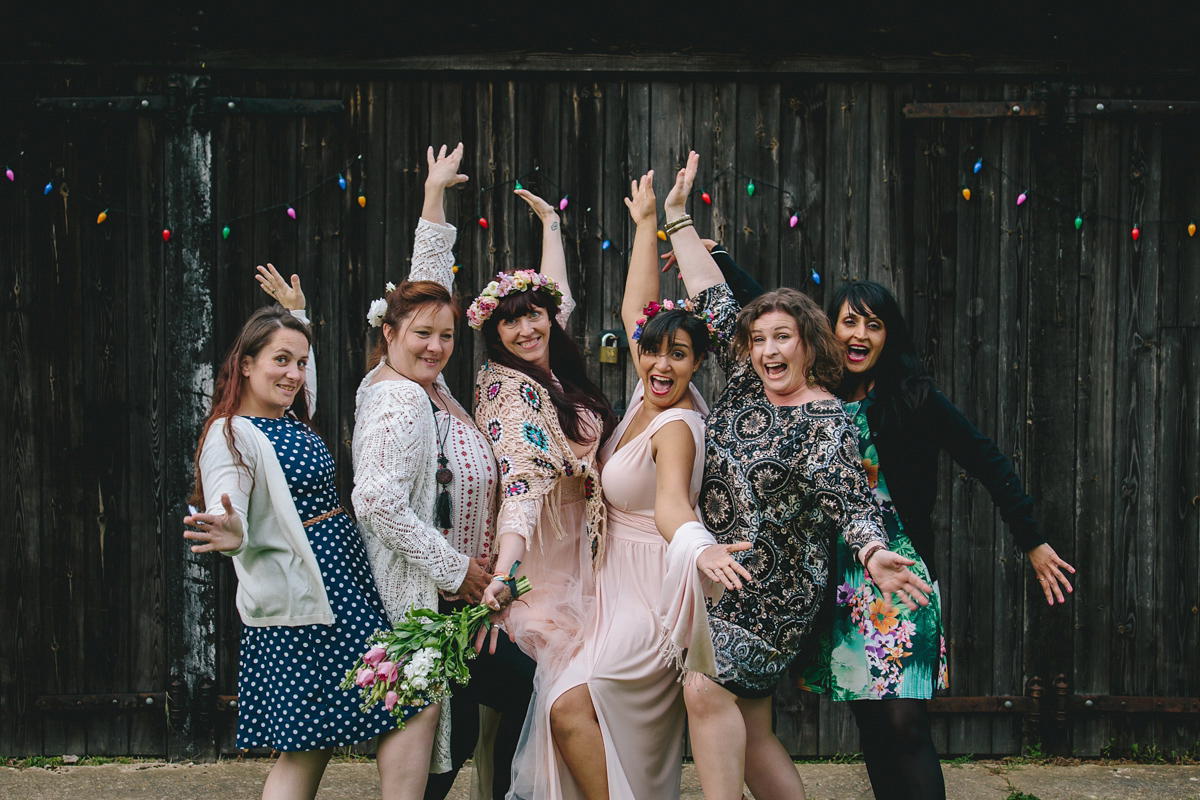 Fran wore a bohemian lace dress for her festival inspired vow renewal held in a meadow. Photography by Joshua Patrick.