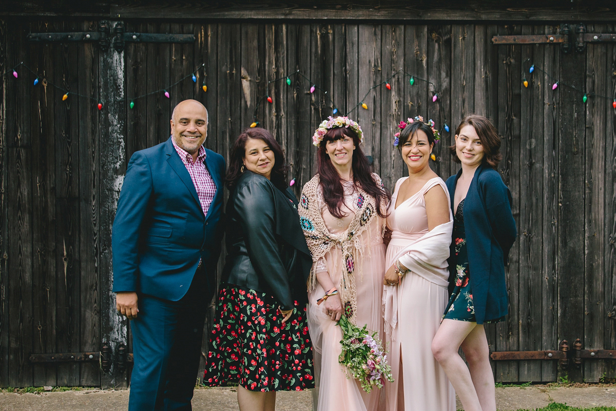 Fran wore a bohemian lace dress for her festival inspired vow renewal held in a meadow. Photography by Joshua Patrick.