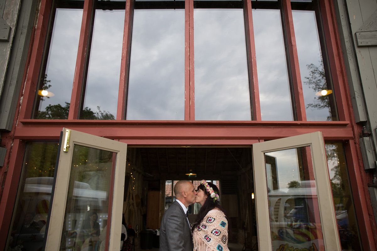 Fran wore a bohemian lace dress for her festival inspired vow renewal held in a meadow. Photography by Joshua Patrick.