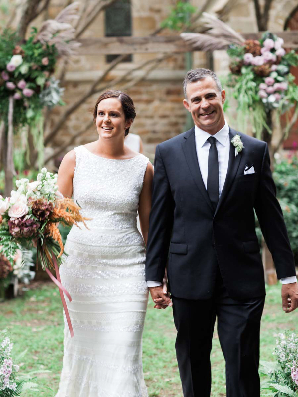 Rebecca wore a Karen Willis Holmes gown for her relaxed and romantic outdoor garden wedding in Australia. Photography by Mr Edwards.