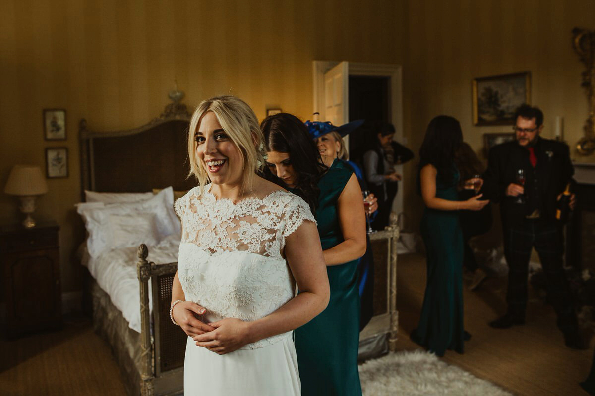 Nicola wears a Stewart Parvin gown for her elegant and romantic 'joining of the clans' inspired Scottish wedding. Photography by The Curries.