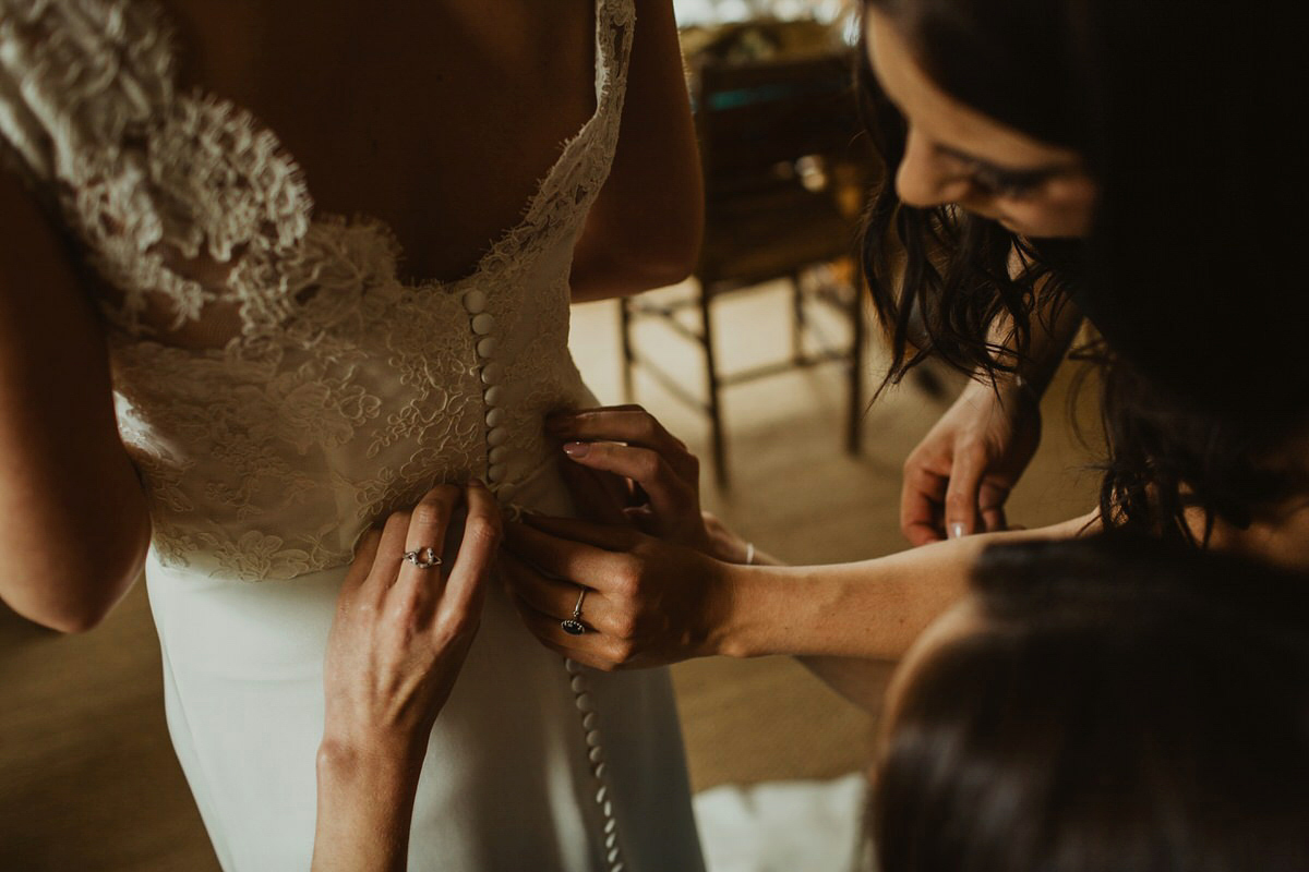 Nicola wears a Stewart Parvin gown for her elegant and romantic 'joining of the clans' inspired Scottish wedding. Photography by The Curries.