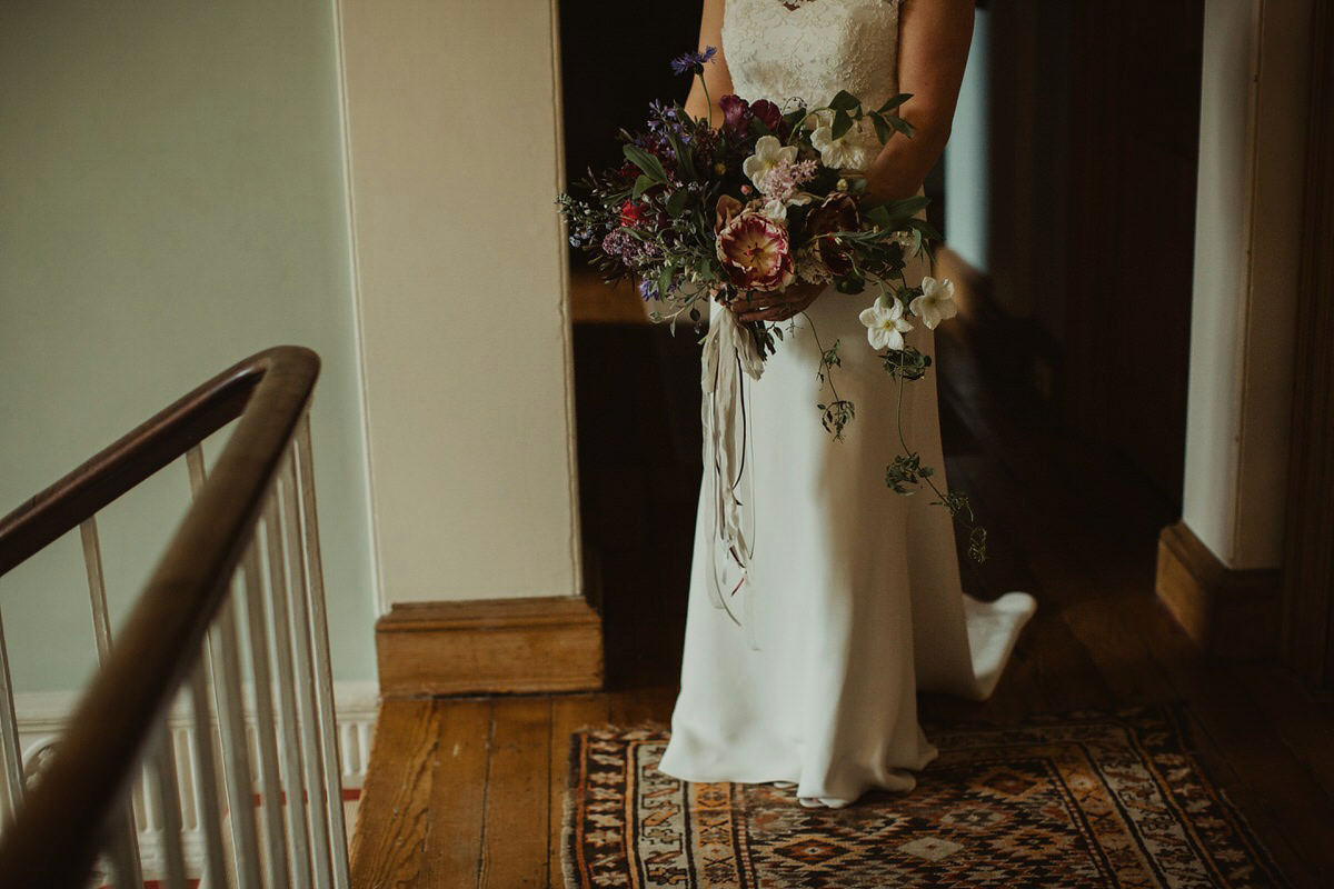 Nicola wears a Stewart Parvin gown for her elegant and romantic 'joining of the clans' inspired Scottish wedding. Photography by The Curries.