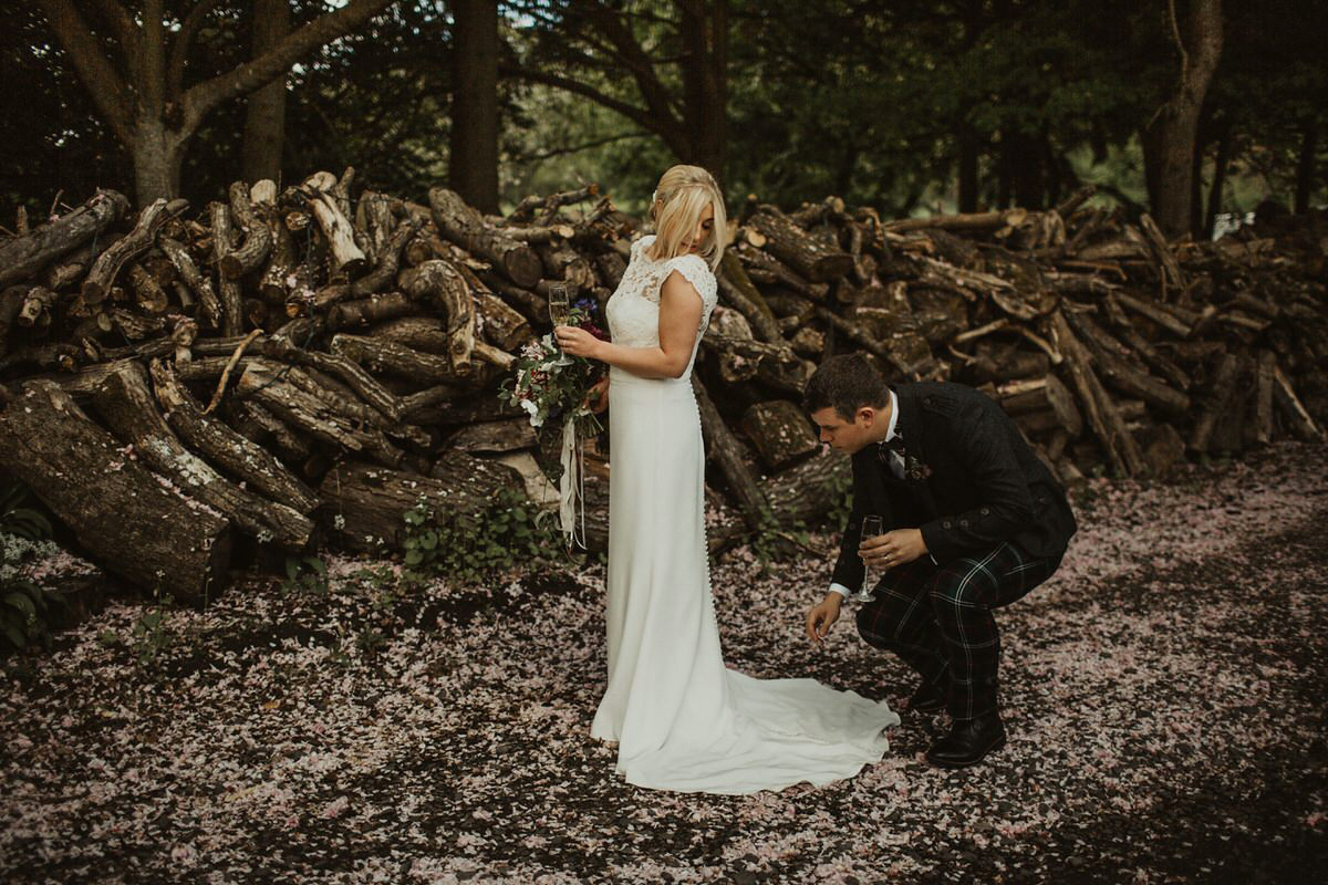 Nicola wears a Stewart Parvin gown for her elegant and romantic 'joining of the clans' inspired Scottish wedding. Photography by The Curries.