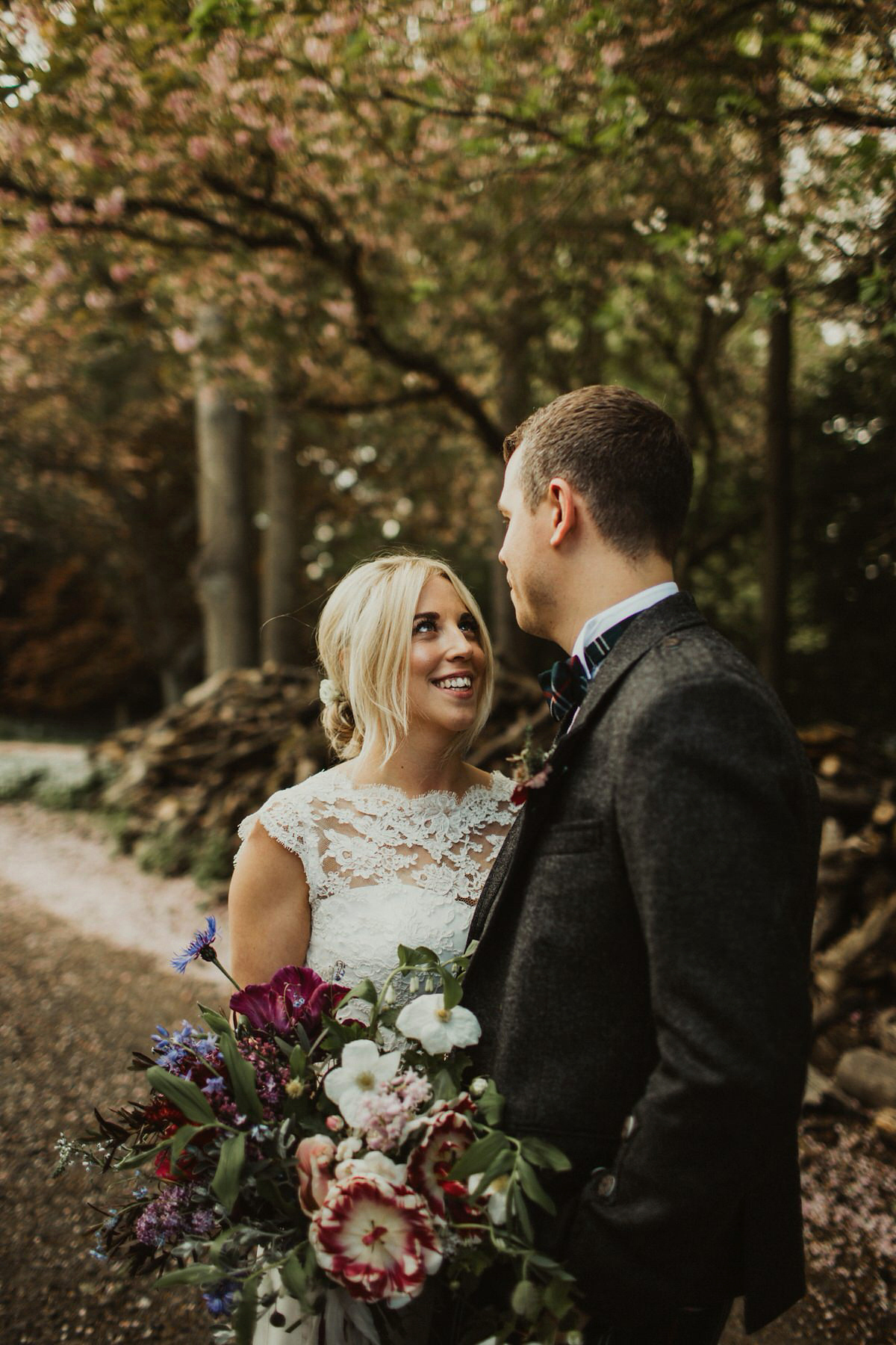 Nicola wears a Stewart Parvin gown for her elegant and romantic 'joining of the clans' inspired Scottish wedding. Photography by The Curries.