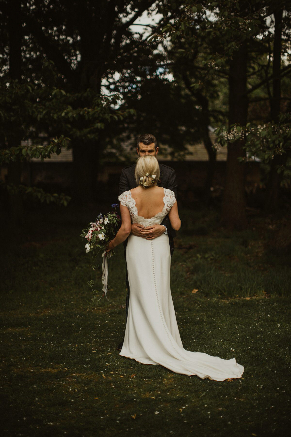 Nicola wears a Stewart Parvin gown for her elegant and romantic 'joining of the clans' inspired Scottish wedding. Photography by The Curries.