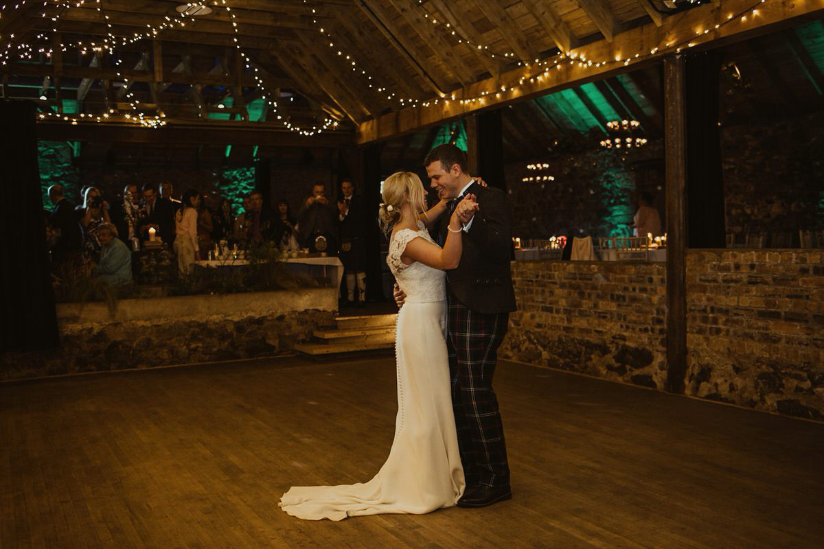 Nicola wears a Stewart Parvin gown for her elegant and romantic 'joining of the clans' inspired Scottish wedding. Photography by The Curries.