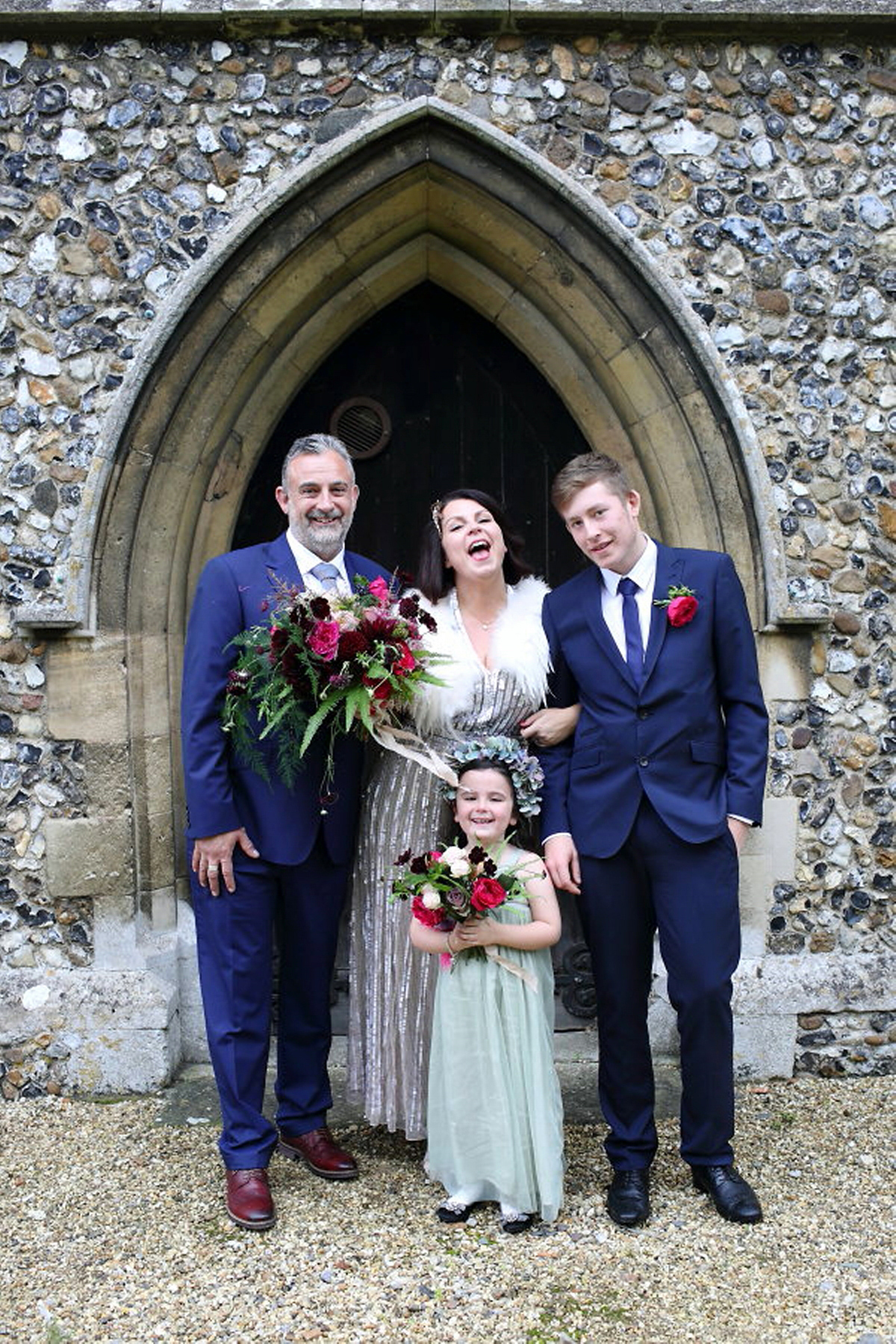 Florist Sam of Violets & Velvet wore a sequin dress by 'Somerset' by Alice Temperley for her colourful and flower-filled village hall wedding. Photography by Rebecca Prigmore.