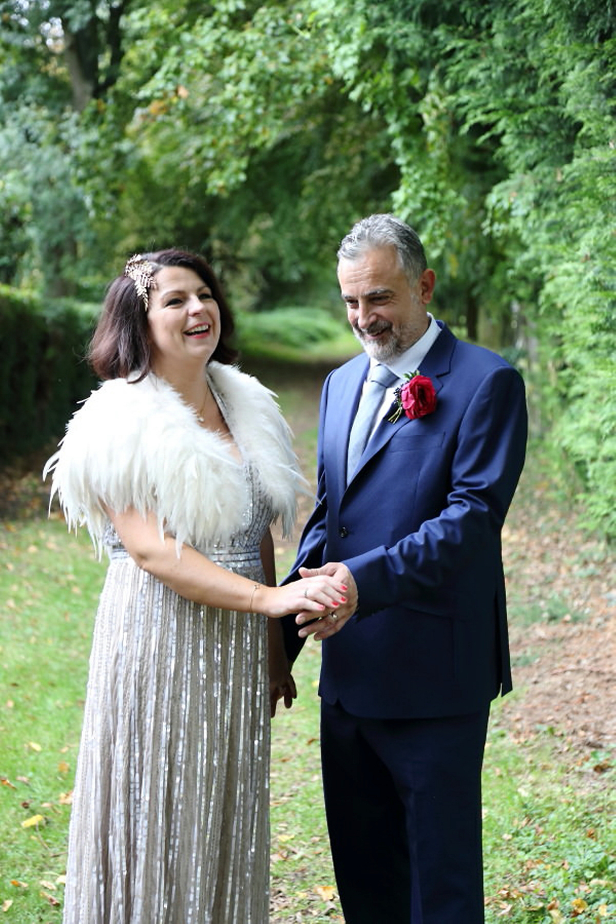 Florist Sam of Violets & Velvet wore a sequin dress by 'Somerset' by Alice Temperley for her colourful and flower-filled village hall wedding. Photography by Rebecca Prigmore.