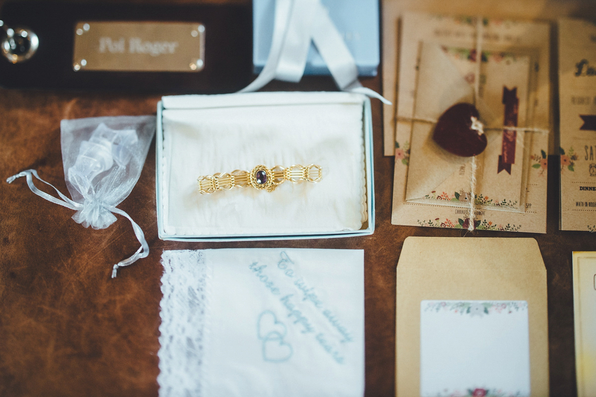 Lucy wore a 1920s inspired drop waist gown by Charlie Brear for her magical Autumn Papakata tipi wedding at Middlesmoor in Yorkshire. Silversixpence Films + Flawless Photography.