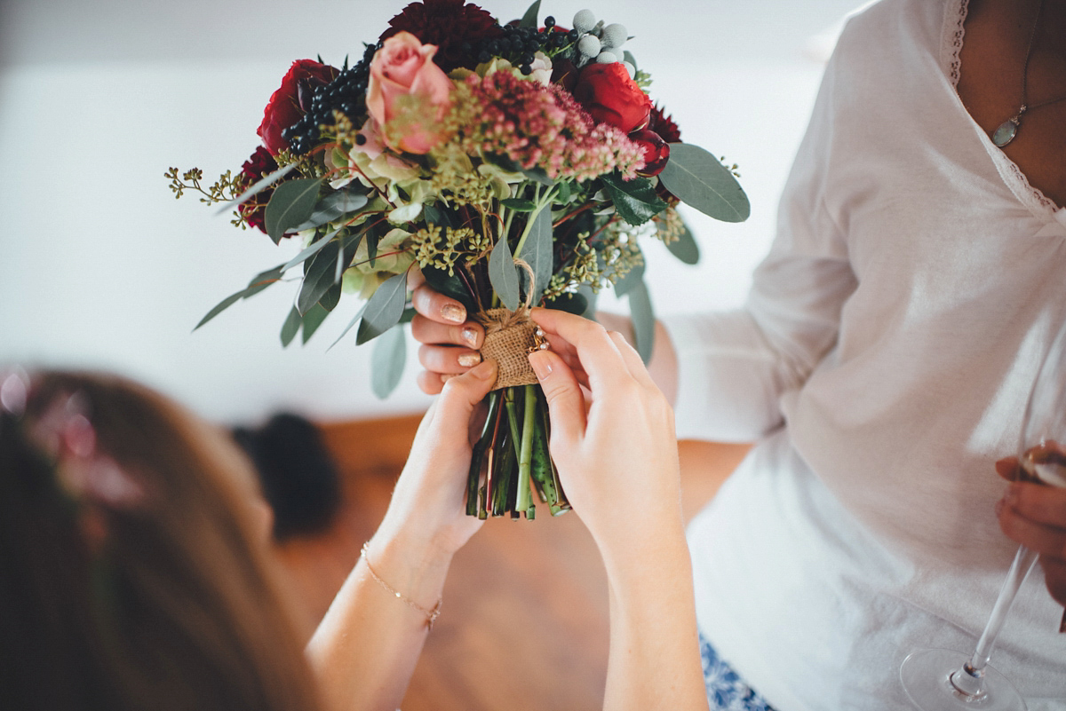 Lucy wore a 1920s inspired drop waist gown by Charlie Brear for her magical Autumn Papakata tipi wedding at Middlesmoor in Yorkshire. Silversixpence Films + Flawless Photography.