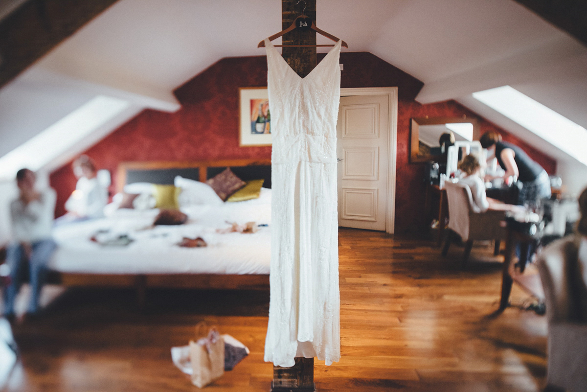 Lucy wore a 1920s inspired drop waist gown by Charlie Brear for her magical Autumn Papakata tipi wedding at Middlesmoor in Yorkshire. Silversixpence Films + Flawless Photography.