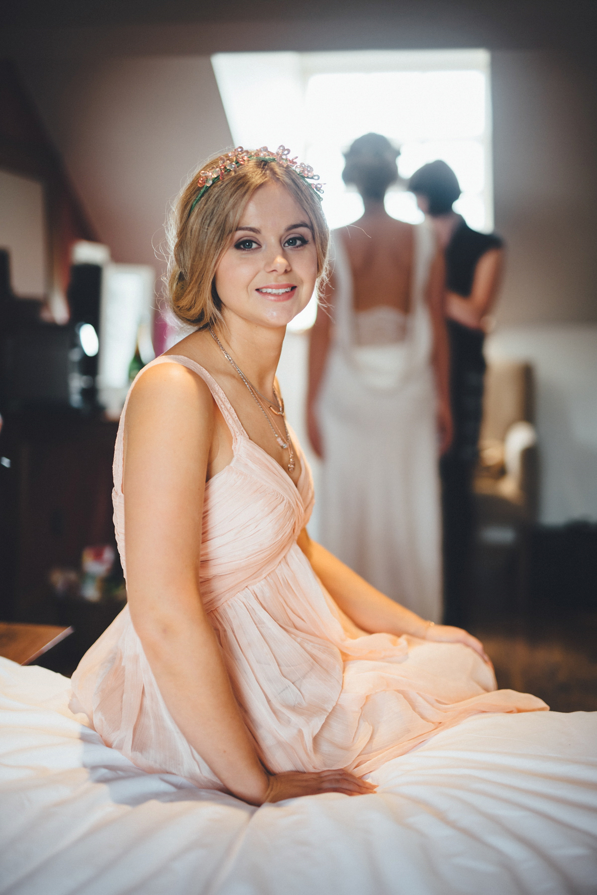 Lucy wore a 1920s inspired drop waist gown by Charlie Brear for her magical Autumn Papakata tipi wedding at Middlesmoor in Yorkshire. Silversixpence Films + Flawless Photography.