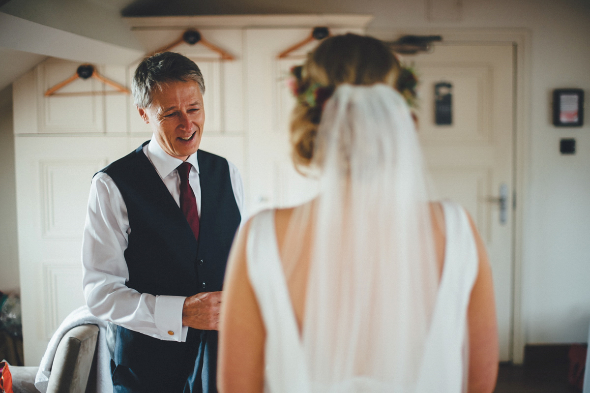 Lucy wore a 1920s inspired drop waist gown by Charlie Brear for her magical Autumn Papakata tipi wedding at Middlesmoor in Yorkshire. Silversixpence Films + Flawless Photography.