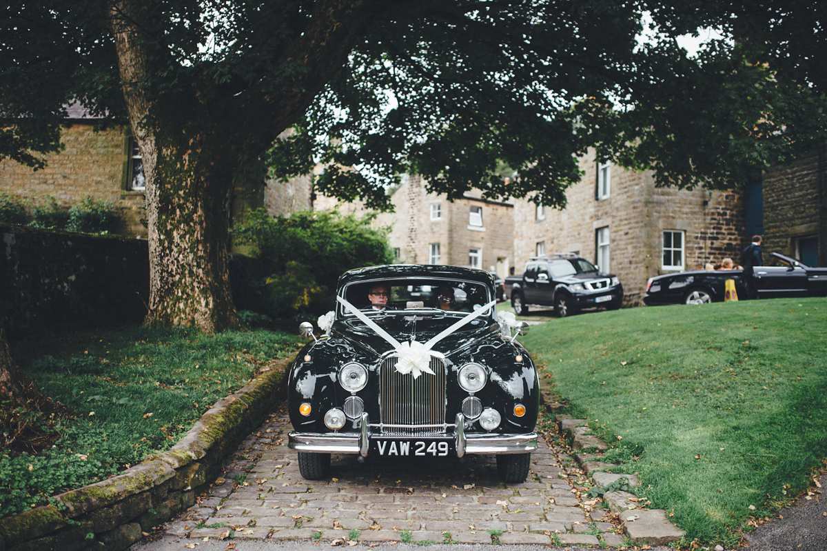 Lucy wore a 1920s inspired drop waist gown by Charlie Brear for her magical Autumn Papakata tipi wedding at Middlesmoor in Yorkshire. Silversixpence Films + Flawless Photography.