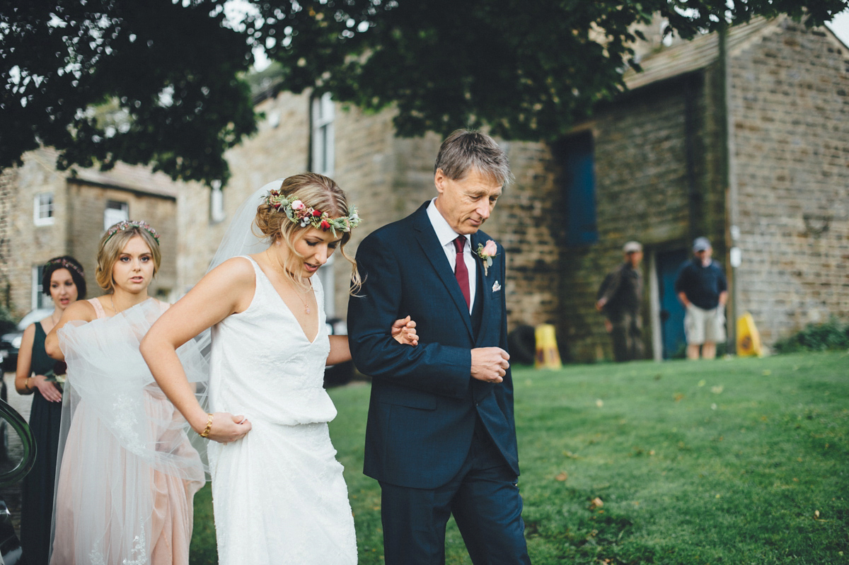 Lucy wore a 1920s inspired drop waist gown by Charlie Brear for her magical Autumn Papakata tipi wedding at Middlesmoor in Yorkshire. Silversixpence Films + Flawless Photography.