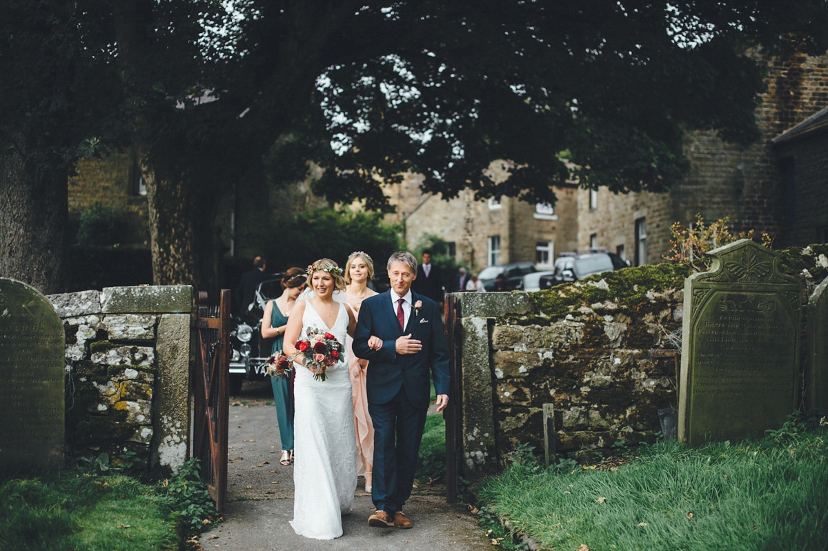 Lucy wore a 1920s inspired drop waist gown by Charlie Brear for her magical Autumn Papakata tipi wedding at Middlesmoor in Yorkshire. Silversixpence Films + Flawless Photography.