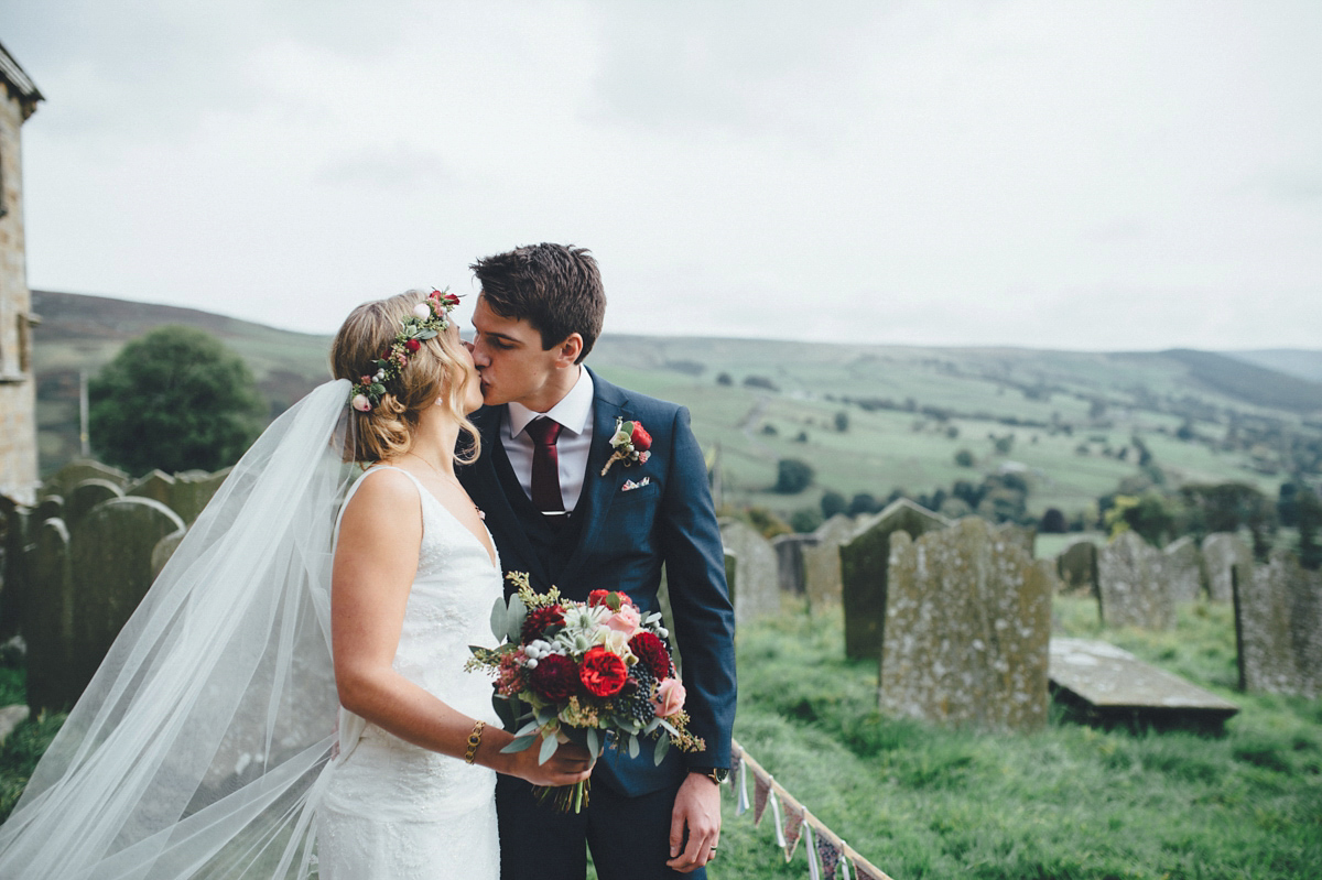 Lucy wore a 1920s inspired drop waist gown by Charlie Brear for her magical Autumn Papakata tipi wedding at Middlesmoor in Yorkshire. Silversixpence Films + Flawless Photography.