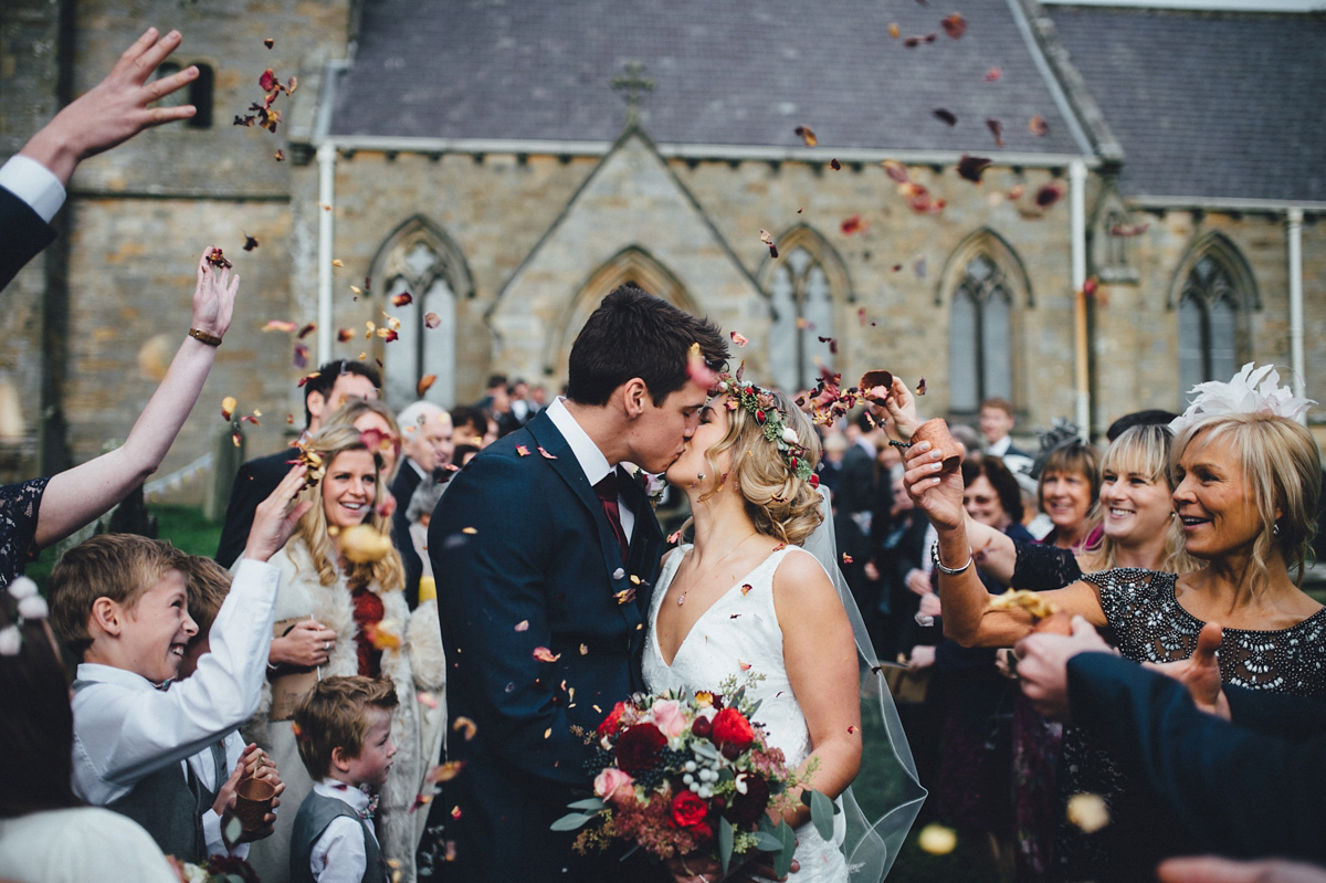 Lucy wore a 1920s inspired drop waist gown by Charlie Brear for her magical Autumn Papakata tipi wedding at Middlesmoor in Yorkshire. Silversixpence Films + Flawless Photography.