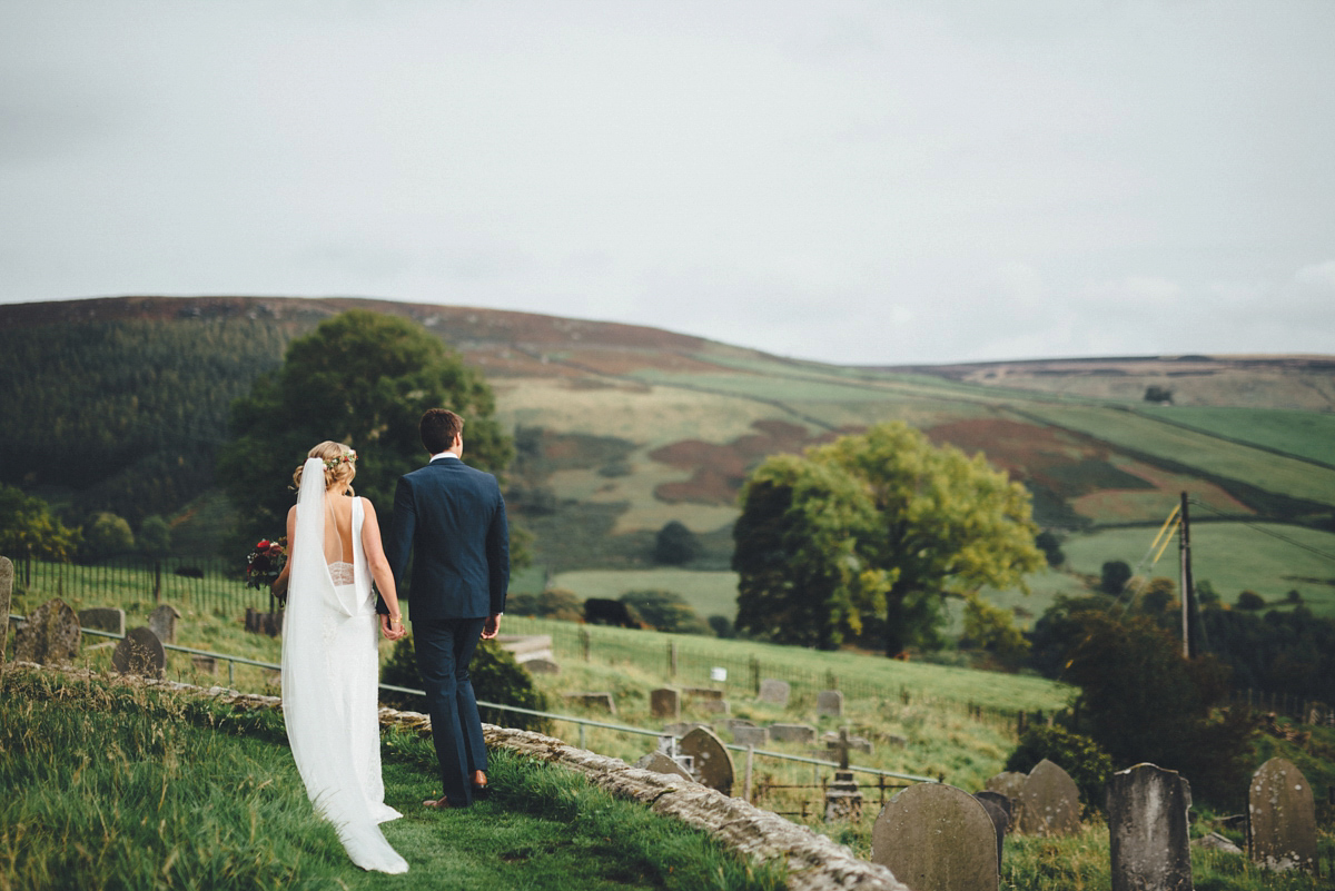 Lucy wore a 1920s inspired drop waist gown by Charlie Brear for her magical Autumn Papakata tipi wedding at Middlesmoor in Yorkshire. Silversixpence Films + Flawless Photography.