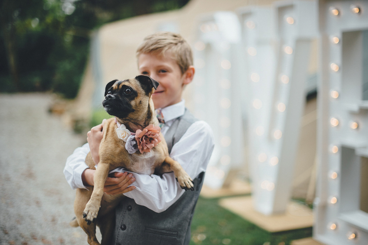 Lucy wore a 1920s inspired drop waist gown by Charlie Brear for her magical Autumn Papakata tipi wedding at Middlesmoor in Yorkshire. Silversixpence Films + Flawless Photography.