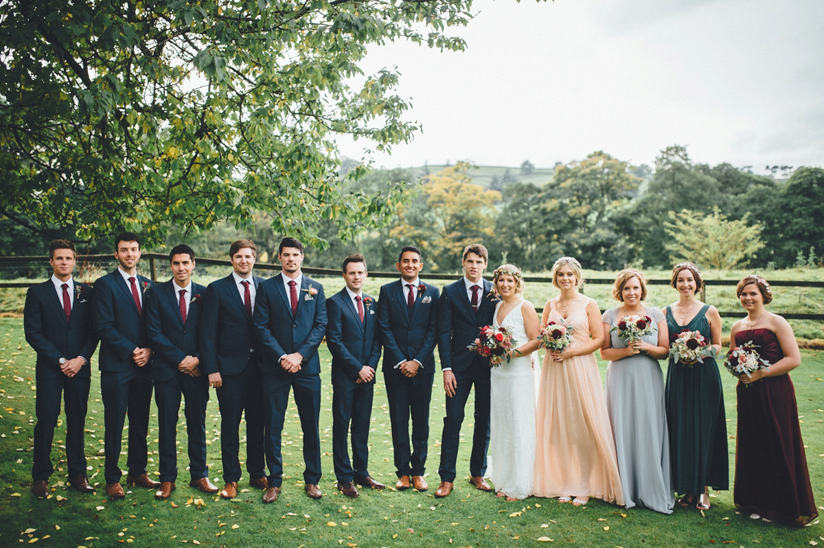 Lucy wore a 1920s inspired drop waist gown by Charlie Brear for her magical Autumn Papakata tipi wedding at Middlesmoor in Yorkshire. Silversixpence Films + Flawless Photography.