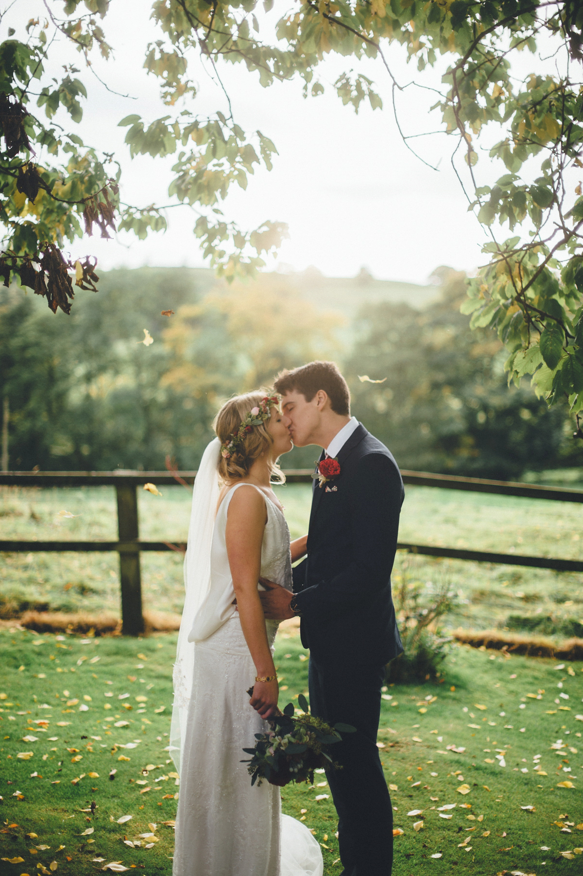 Lucy wore a 1920s inspired drop waist gown by Charlie Brear for her magical Autumn Papakata tipi wedding at Middlesmoor in Yorkshire. Silversixpence Films + Flawless Photography.