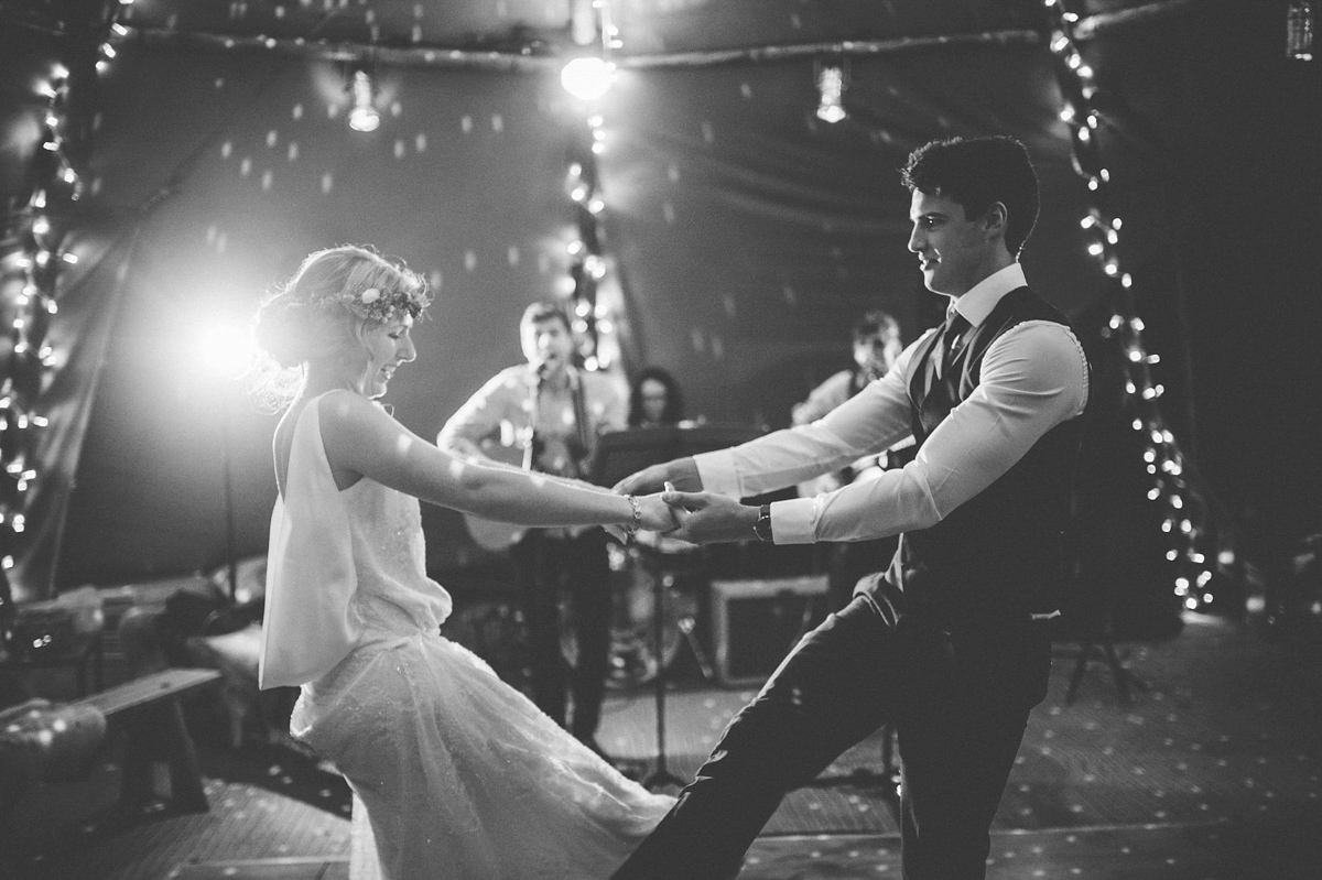 Lucy wore a 1920s inspired drop waist gown by Charlie Brear for her magical Autumn Papakata tipi wedding at Middlesmoor in Yorkshire. Silversixpence Films + Flawless Photography.