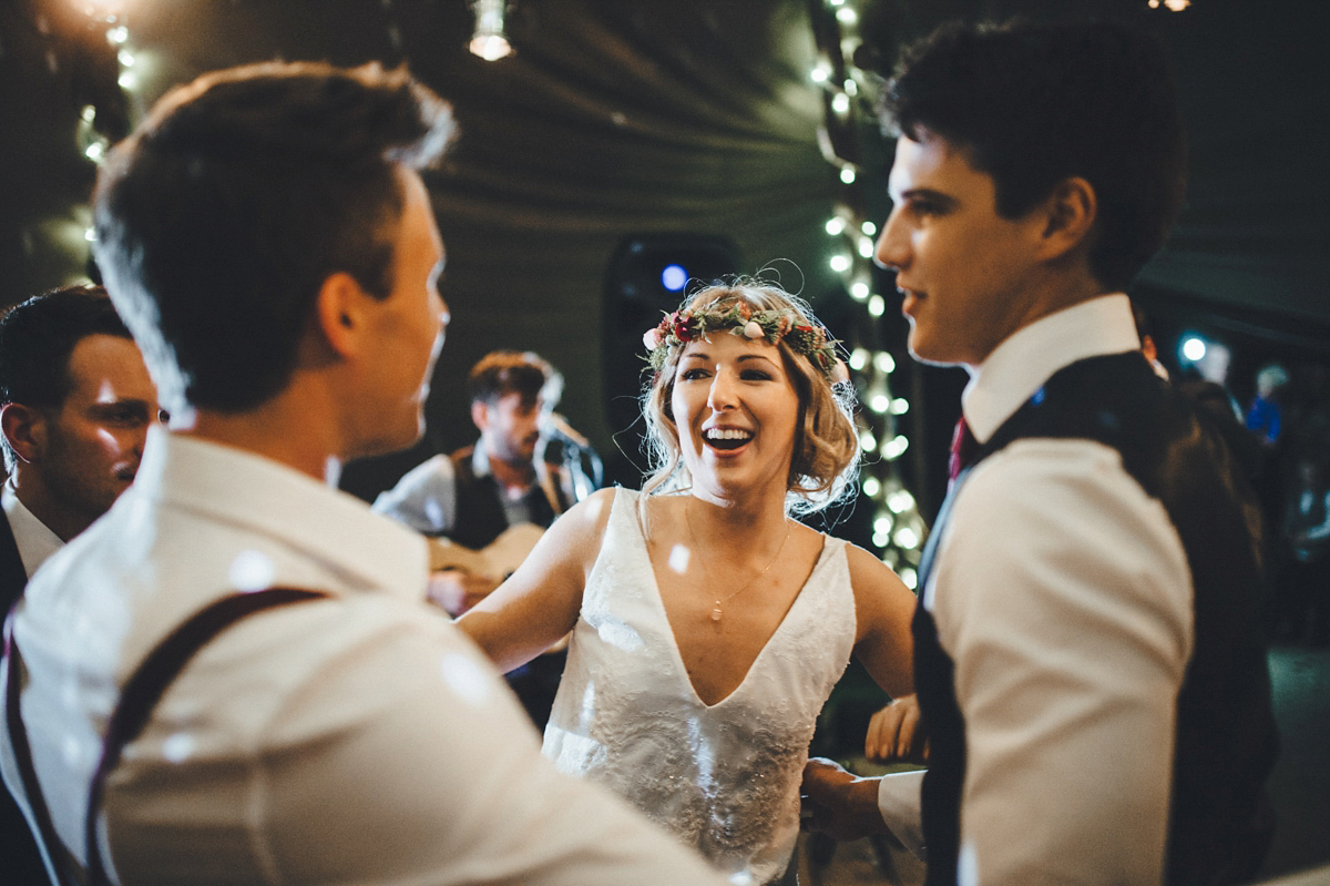 Lucy wore a 1920s inspired drop waist gown by Charlie Brear for her magical Autumn Papakata tipi wedding at Middlesmoor in Yorkshire. Silversixpence Films + Flawless Photography.