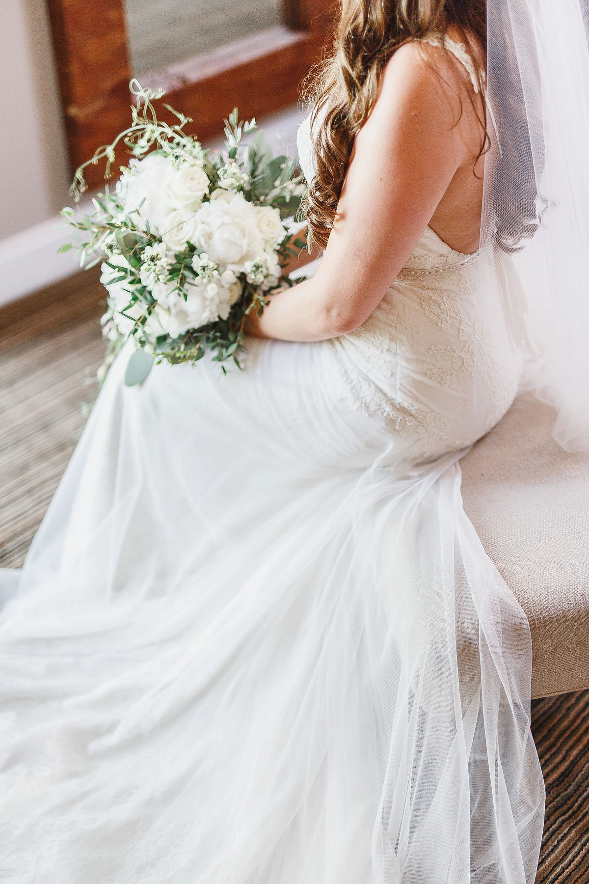 Stephanie wore a backless lace dress for her outdoor Spring wedding held at Hyde House country house hotel. Images by White Stag Photography.