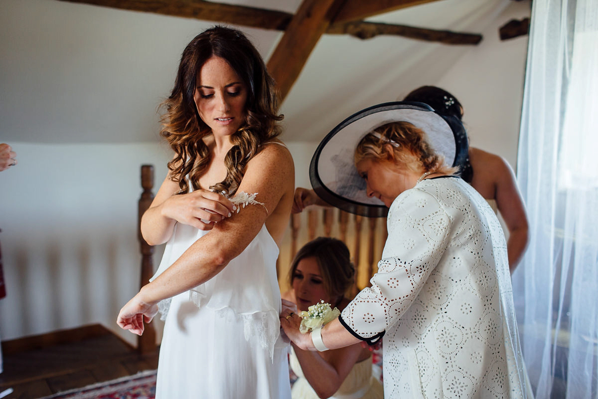 Gemma wore a boho inspired wedding dress by Wilden bride for her lovely Spring country house wedding in Devon. Images by Freckle Photography.