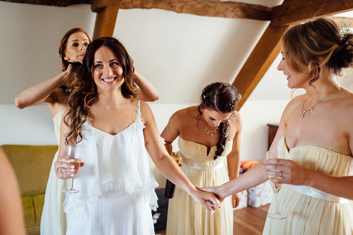 Gemma wore a boho inspired wedding dress by Wilden bride for her lovely Spring country house wedding in Devon. Images by Freckle Photography.