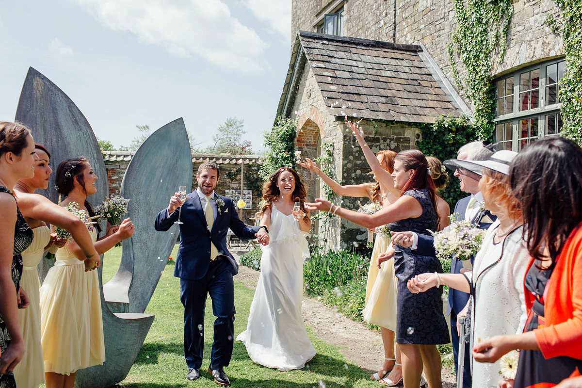 Gemma wore a boho inspired wedding dress by Wilden bride for her lovely Spring country house wedding in Devon. Images by Freckle Photography.