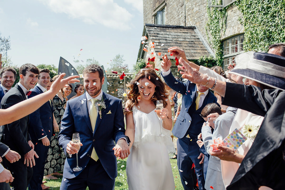 Gemma wore a boho inspired wedding dress by Wilden bride for her lovely Spring country house wedding in Devon. Images by Freckle Photography.