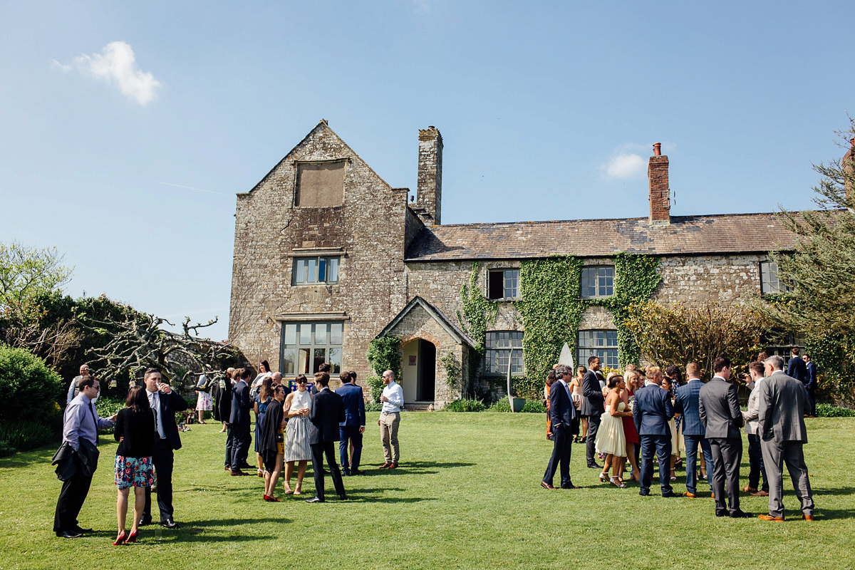 Gemma wore a boho inspired wedding dress by Wilden bride for her lovely Spring country house wedding in Devon. Images by Freckle Photography.