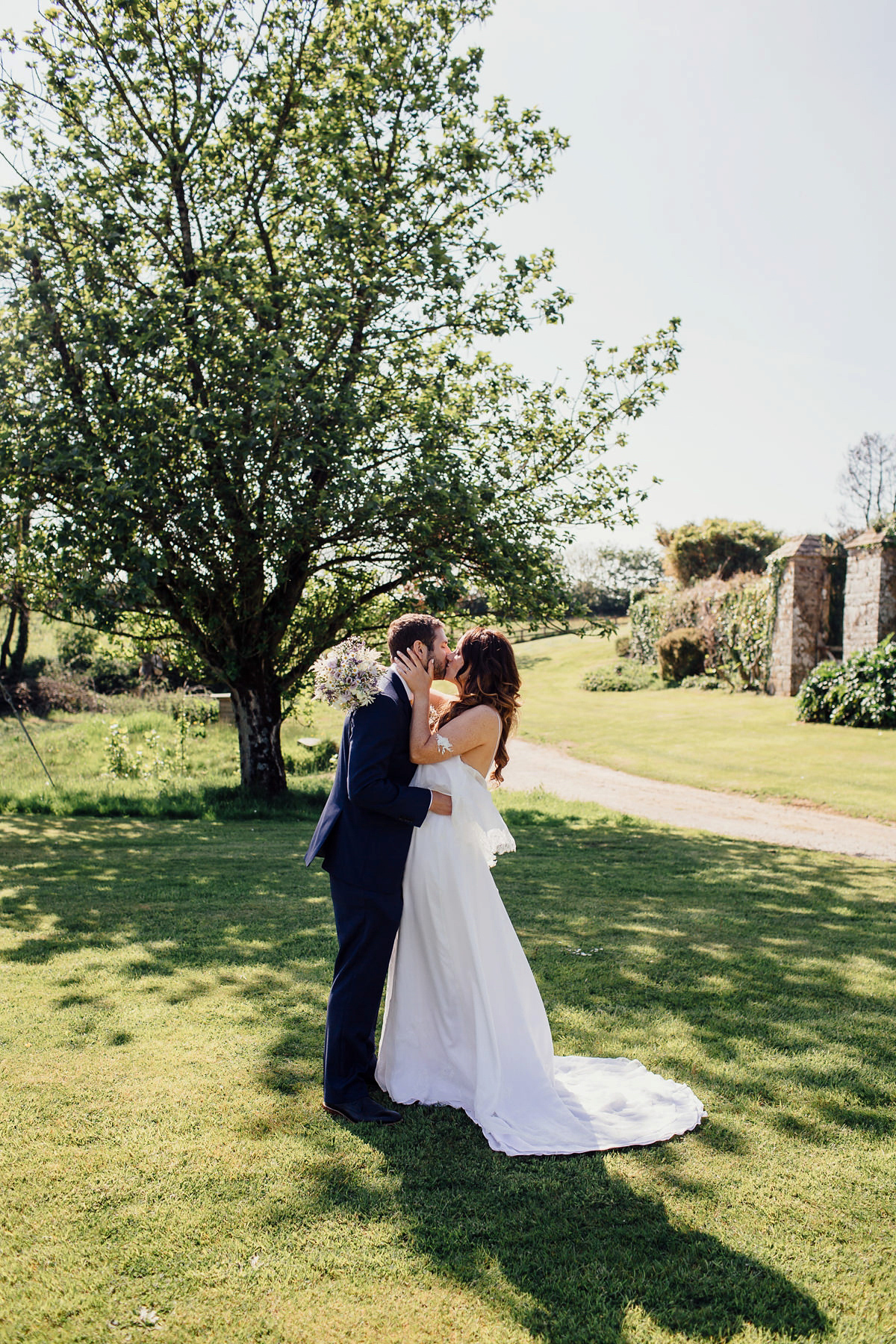 Gemma wore a boho inspired wedding dress by Wilden bride for her lovely Spring country house wedding in Devon. Images by Freckle Photography.