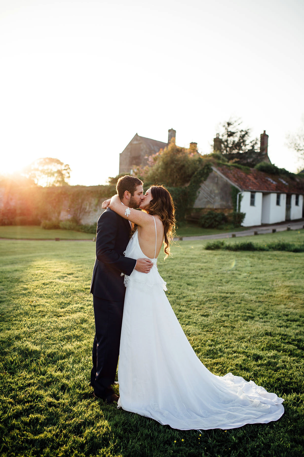 Gemma wore a boho inspired wedding dress by Wilden bride for her lovely Spring country house wedding in Devon. Images by Freckle Photography.