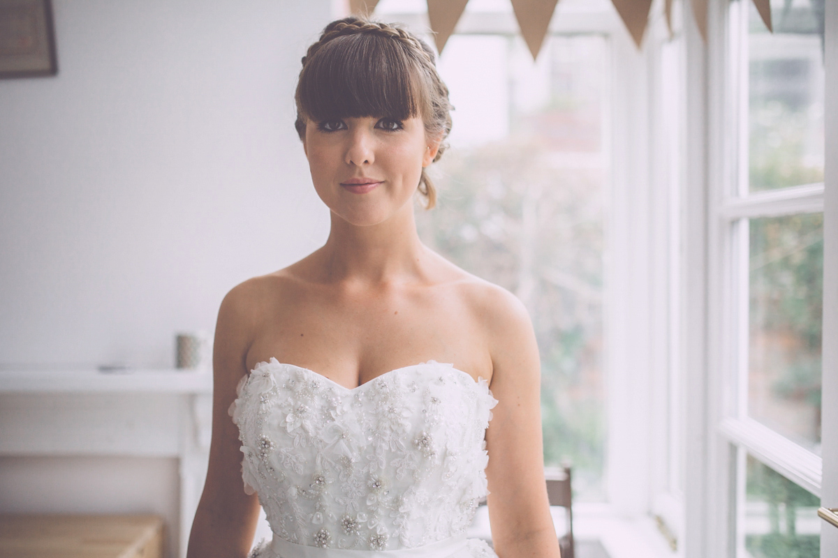 Georgie wore a 1950's inspired Essense of Australia gown for her rustic and rural Somerset barn wedding. Photography by Naomi Jane.