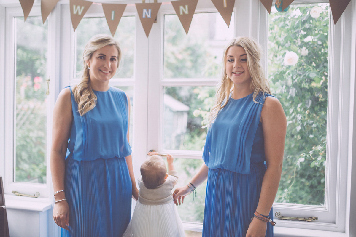 Georgie wore a 1950's inspired Essense of Australia gown for her rustic and rural Somerset barn wedding. Photography by Naomi Jane.