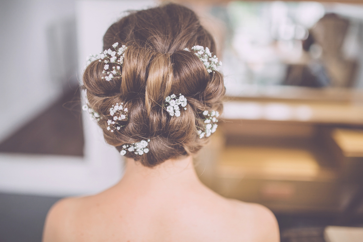 Georgie wore a 1950's inspired Essense of Australia gown for her rustic and rural Somerset barn wedding. Photography by Naomi Jane.